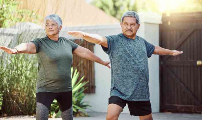An old couple doing excercises