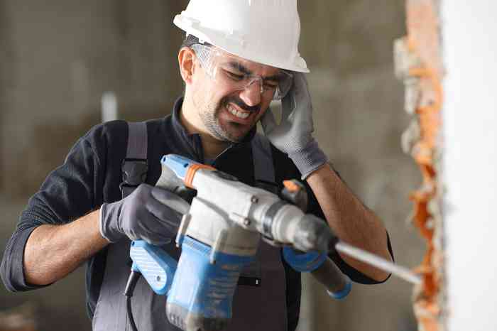 A man working in loud environment