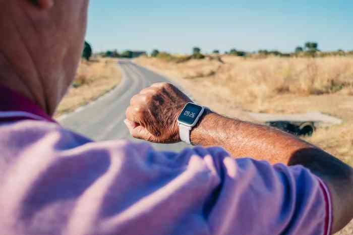 a man watching at his smartwatch
