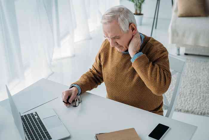 Man with pain from lump behind the ear