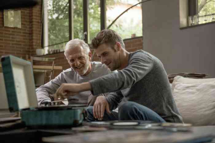 Grandfather and Grandson listening to music