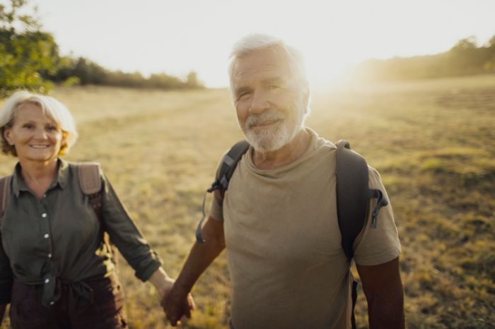 Couple on walk in field 