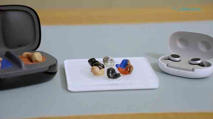 Lady trying the hearing aid