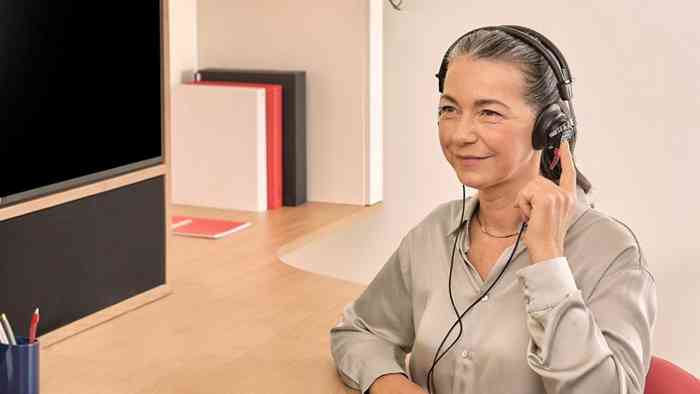 A woman undergoing a hearing test