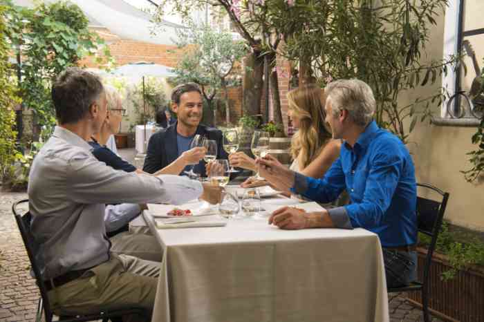 Friends sharing a meal together at the restaurant 