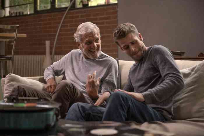 Grandfather laughing and enjoying his time with his grandson