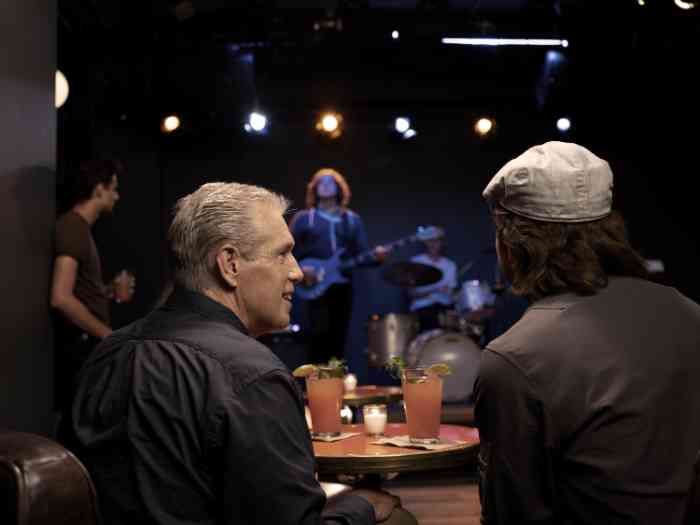 live music performance at a cabaret table.