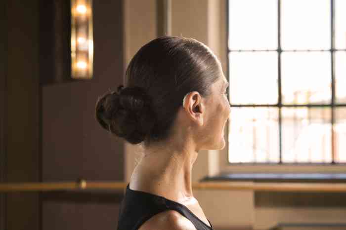 A woman wearing hearing aids while dancing tango