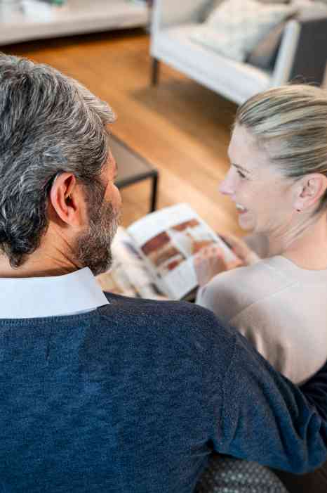 Couple reading an catalog
