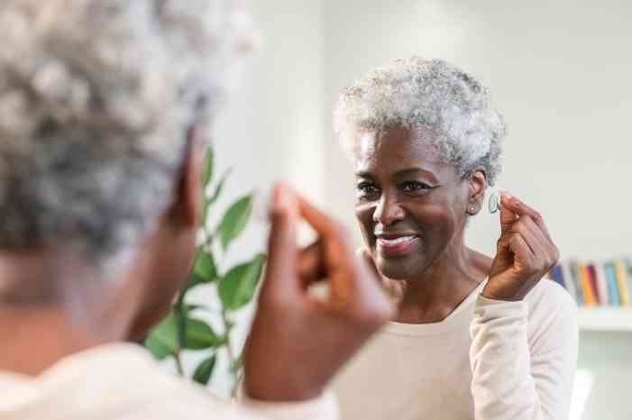 Woman wearing hearing aid