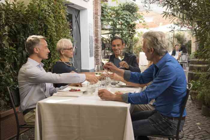 Friends sharing a meal together at the restaurant 