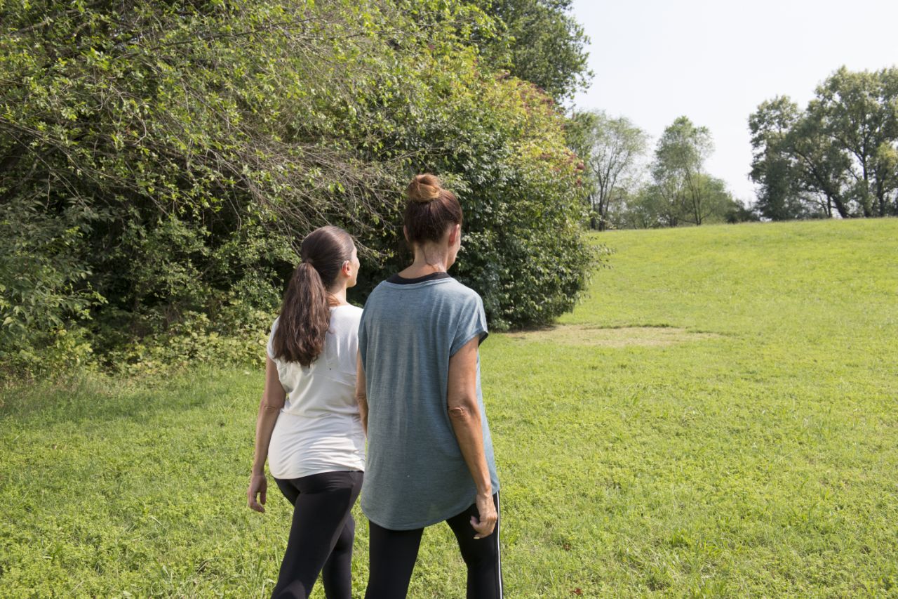 woman walking in the park.
