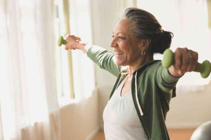 A senior woman doing some excercise with weights