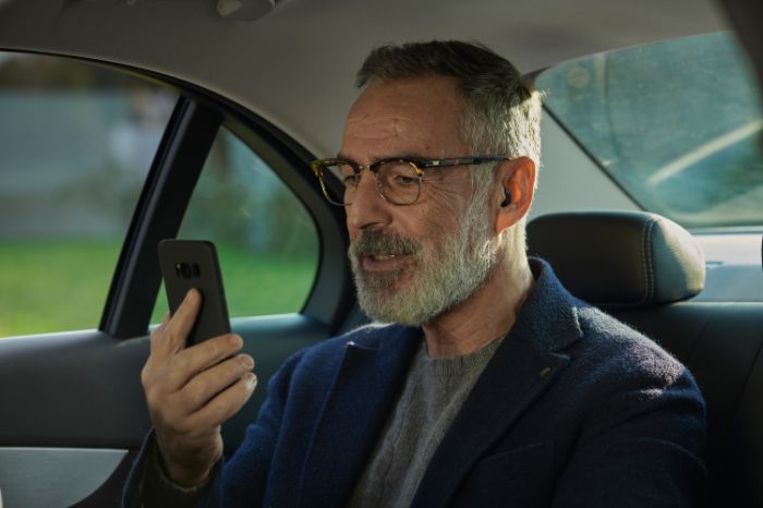 Man phone hearing aids