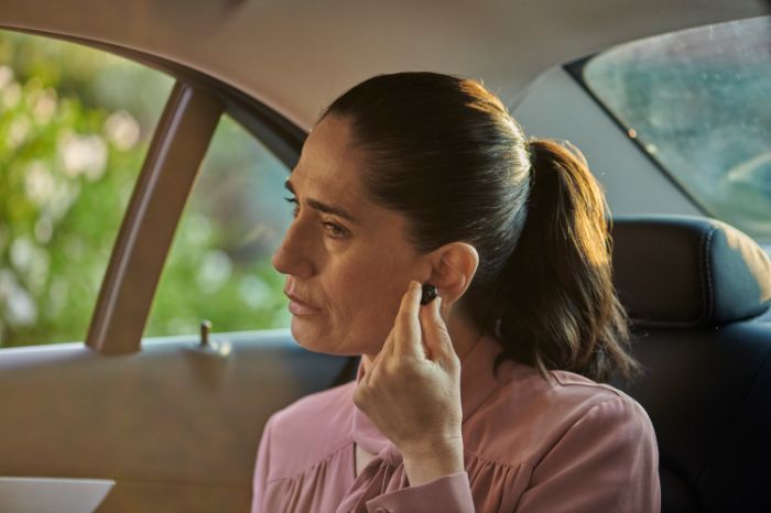 Two women talking on the phone
