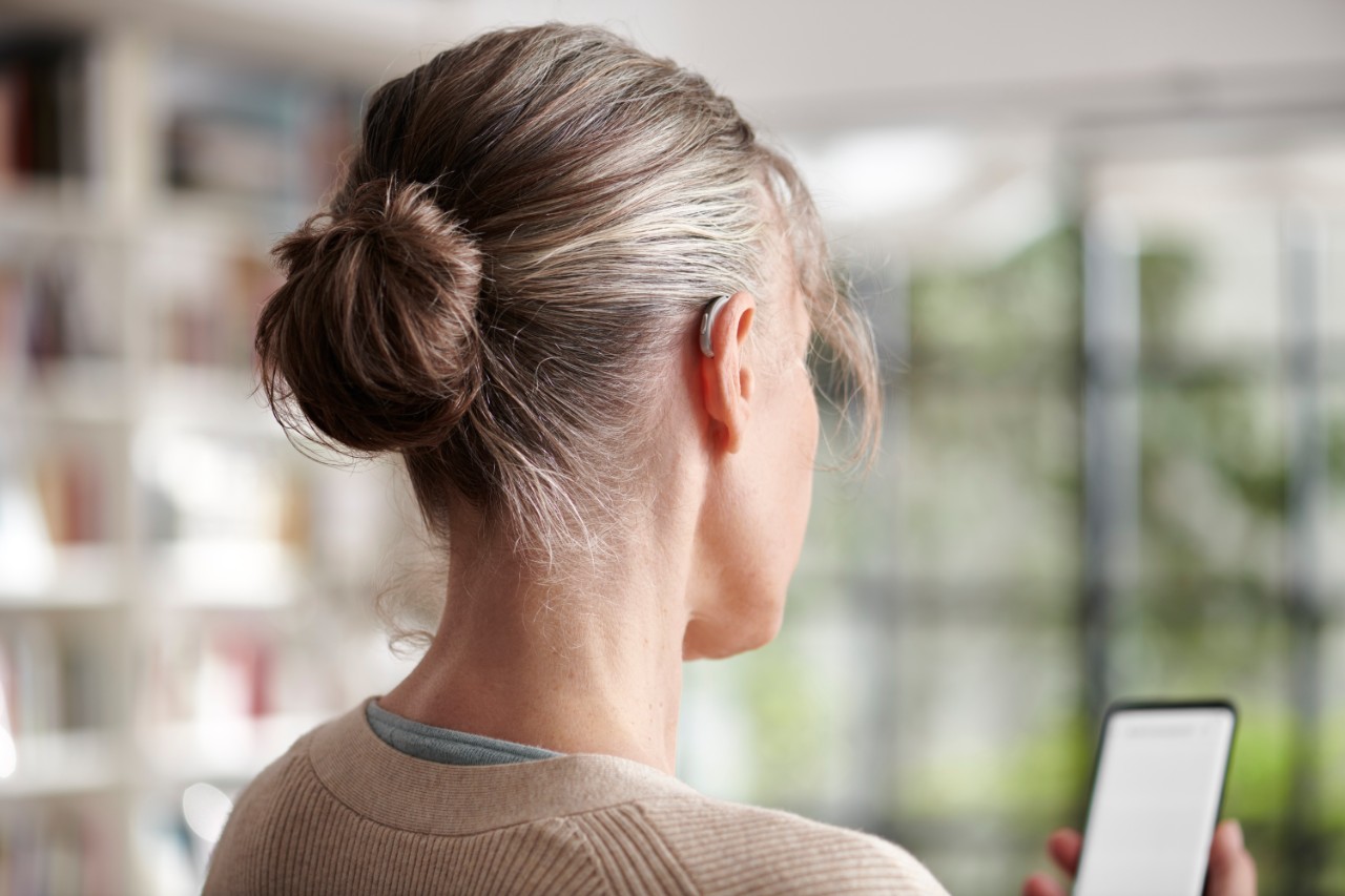A digital hearing aid connected to a smartphone