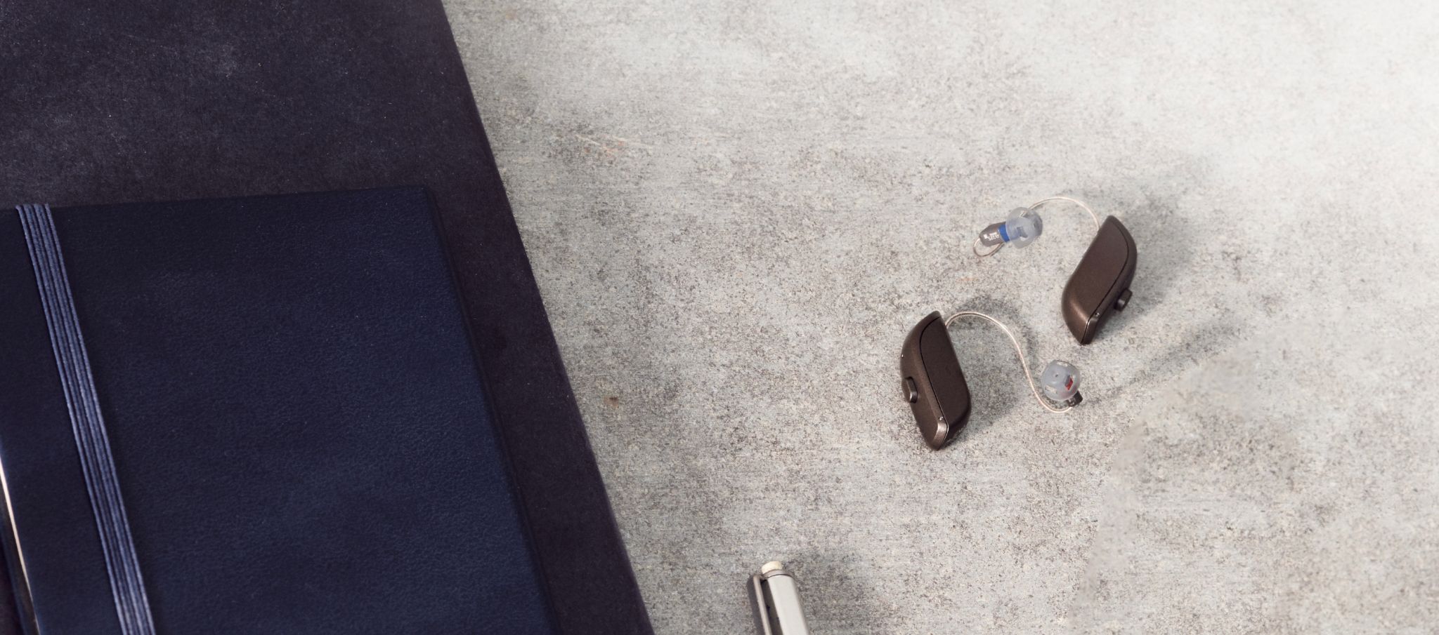 Manutenzione e pulizia dell'apparecchio acustico RIC